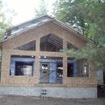 Front of addition with window openings roughed in. Large insulated glass windows increase light and energy efficiency. 