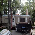 Showing the home with the roof structure removed to allow the walls to be placed.